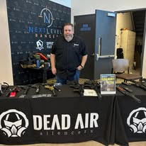 Dead Air Silencers representative at a Vendor Demo Day booth